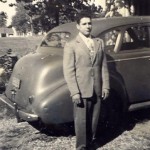 Greg in front of car